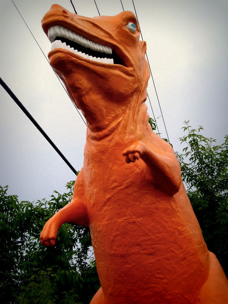 The orange fiberglass dinosaur on Route 1 in Saugus, mouth open, arms out
