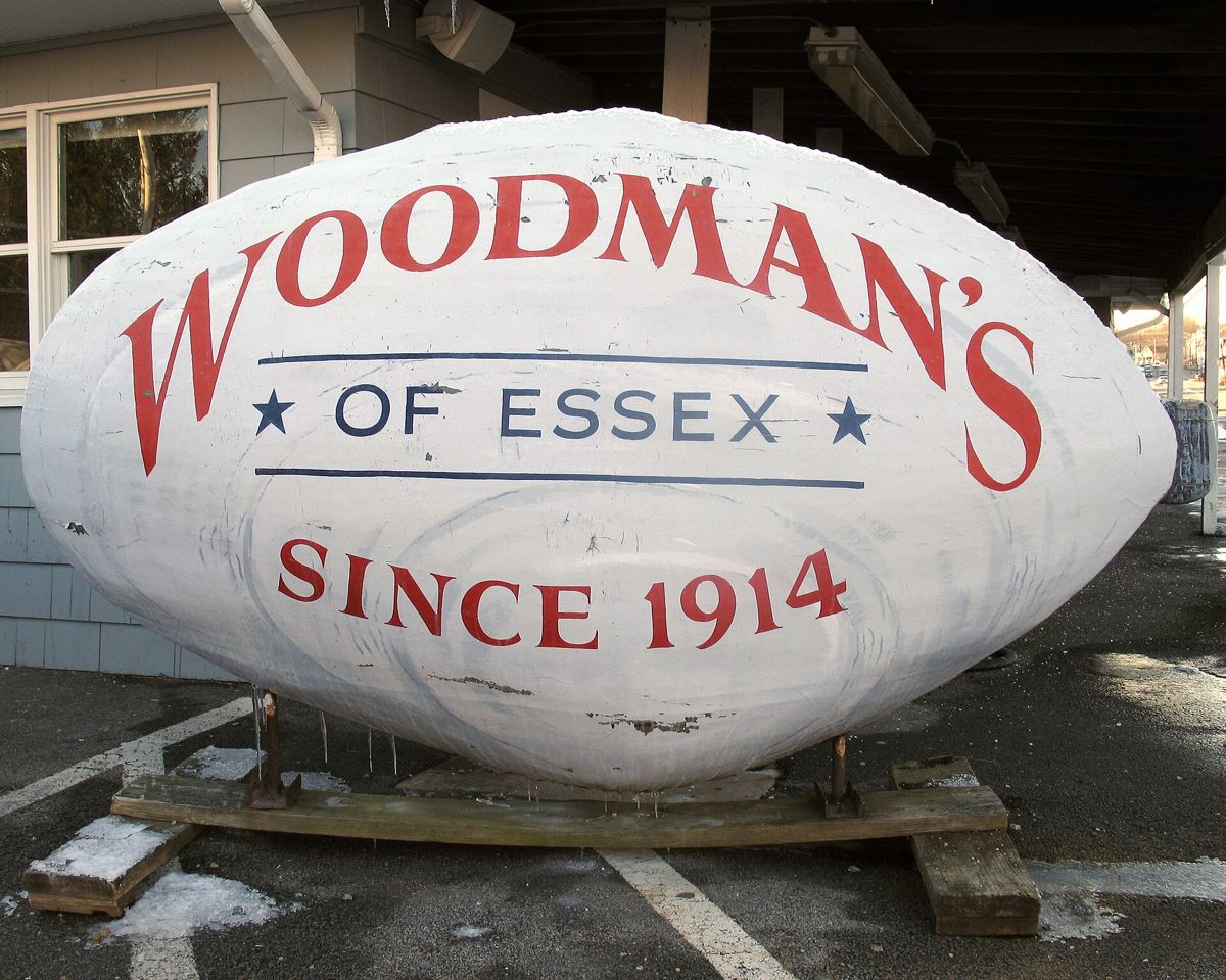 A big painted rock reading Woodman's of Essex, since 1914